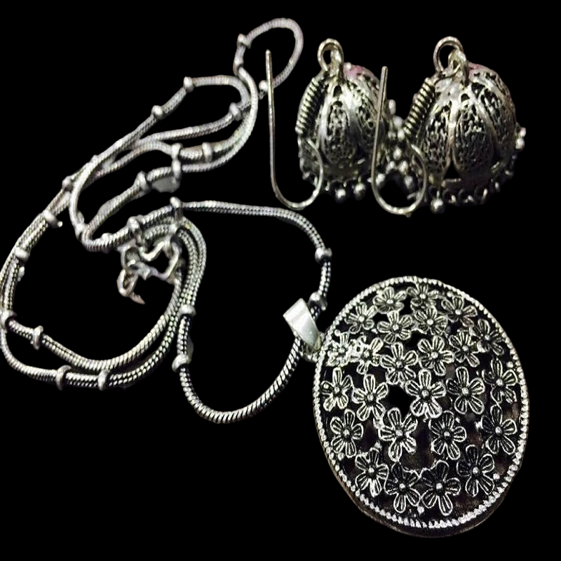 Round Floral German Silver Pendant With Jhumkas