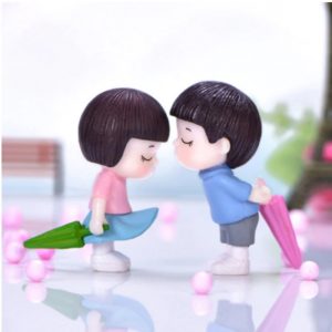 Miniature Cute Boy And Girl With Umbrella