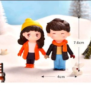 Miniature Boy And Girl In Winter