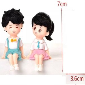 Miniature Boy And Girl With Black Hair