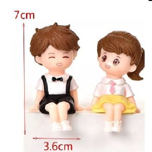 Miniature Boy And Girl With Brown Hair