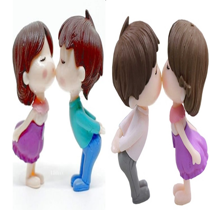 Miniature Kissing Boy And Girl