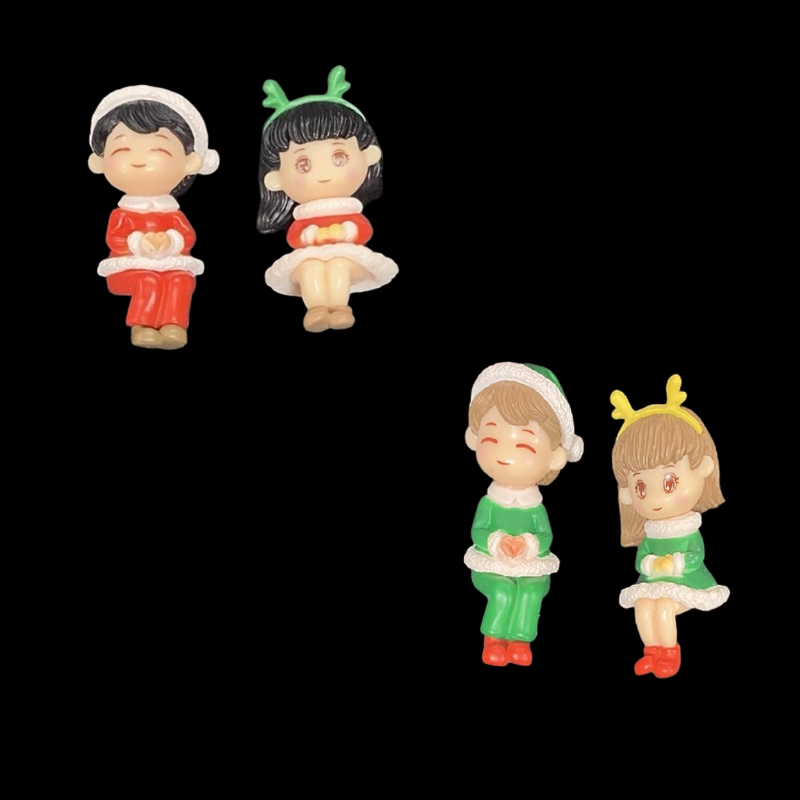 Miniature Boy And Girl Wearing Christmas Dress