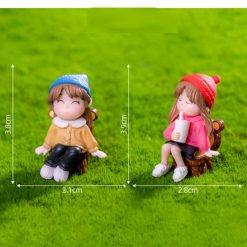 Miniature Two Girls Sitting In Chair